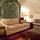 For more than 2 guests, the firm couch makes a nice bed.  Take off the back cushions and it is as wide as a twin.