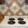 Kitchen is equipped with vintage oven, microwave, coffee maker and refrigerator