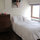 The very private, cosy and clean bedroom overlooks Stuyvesant Square park; at night, the view is especially captivating. 