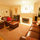 Living room from the hall doorway.  That's the front door behind big chair. 