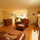 Living room, mantle, front door