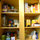 KItchen cabinet well stocked with coffee, tea, spices and lots more for you to use.