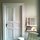 A typical Berliner Altbau Door. Have a seat on an Original Barcelona Chair (Mies Van der Rohe)