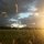 sunset over the field behind the house