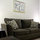 Velvet sofa and burnt velvet chairs provide seating for four.