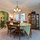 dining room with bay window, door to the deck, opens into Playroom... dining space for 20 with all the tables set up