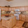 Spacious kitchen with full set of cookware