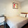 Secondary bedroom with double bed and workstation