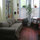 Sunny front room/second bedroom. There is this sofa and fold out sleeper.