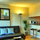Living room with bar area.  Not in picture, views to the left and HD TV to the front