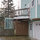 Driveway with Welcome sign. Door to studio to the right of sign.