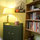 Green wicker cabinet and bookcase.