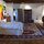 The Sophisticated Salon Featuring 2 Kivas, Original Artwork and a Grand Piano!