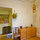 Sideboard holds extra dishes, board games and other needed items.  