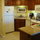 Full kitchen with granite counter tops.