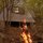 1 cabin next to one of 2 fireplaces