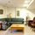Living Room, TV and entry way to the rest of the Condo unit.  