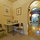 View of kitchen table looking through to living room.
