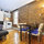 Livingroom towards the kitchen.