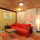 Living room and kitchen looking onto bathroom