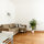 FREIRAUMWOHNUNG: Wohnzimmer mit Sofa (Sofabett 140x200cm) und großzügigem Essbereich / französischer Balkon zum Hinterhof 