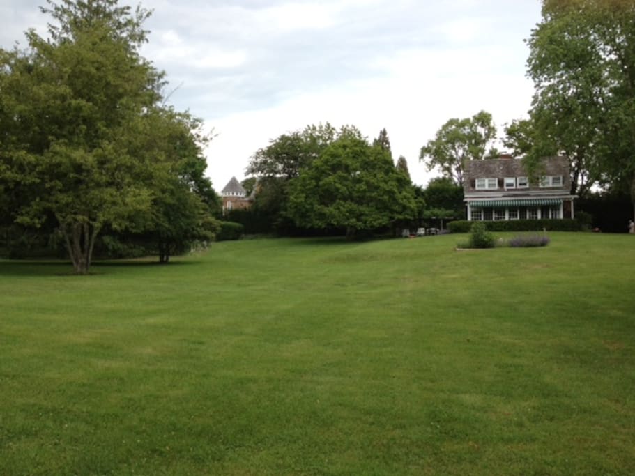 This private East Hampton home offers glorious grounds in the heart of East Hampton