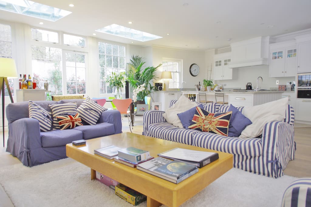 The living room offers a feeling of space, comfort and luxury for you to enjoy, with an abundance of natural light and doors to a spacious garden