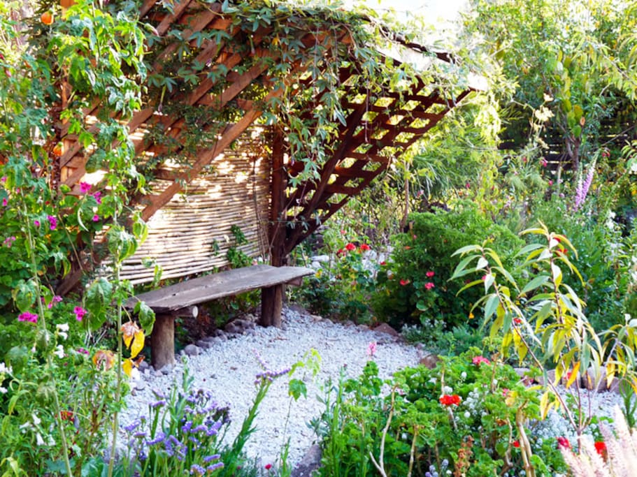 Bench nearby, in the surrounding gardens