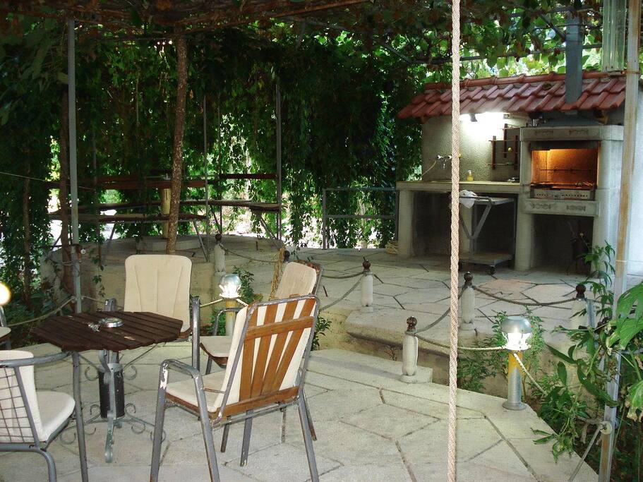 Terrace and barbecue behind the house.