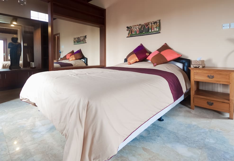 Passionfruit Room is huge with large walk-in robe and tub